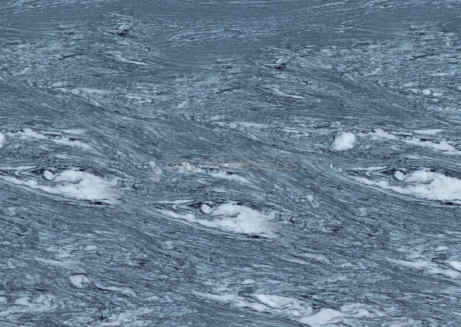 Textured smooth grey marble floor with white streaks