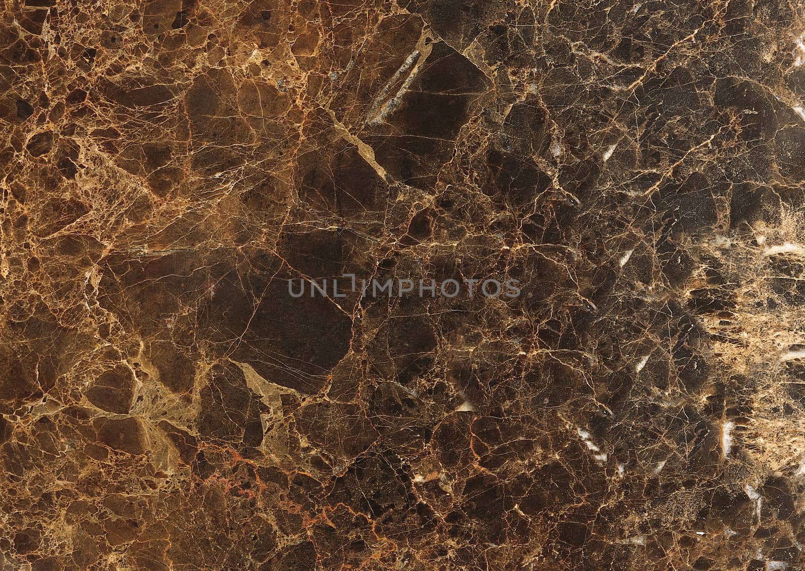 Textured smooth brown marble floor with white streaks