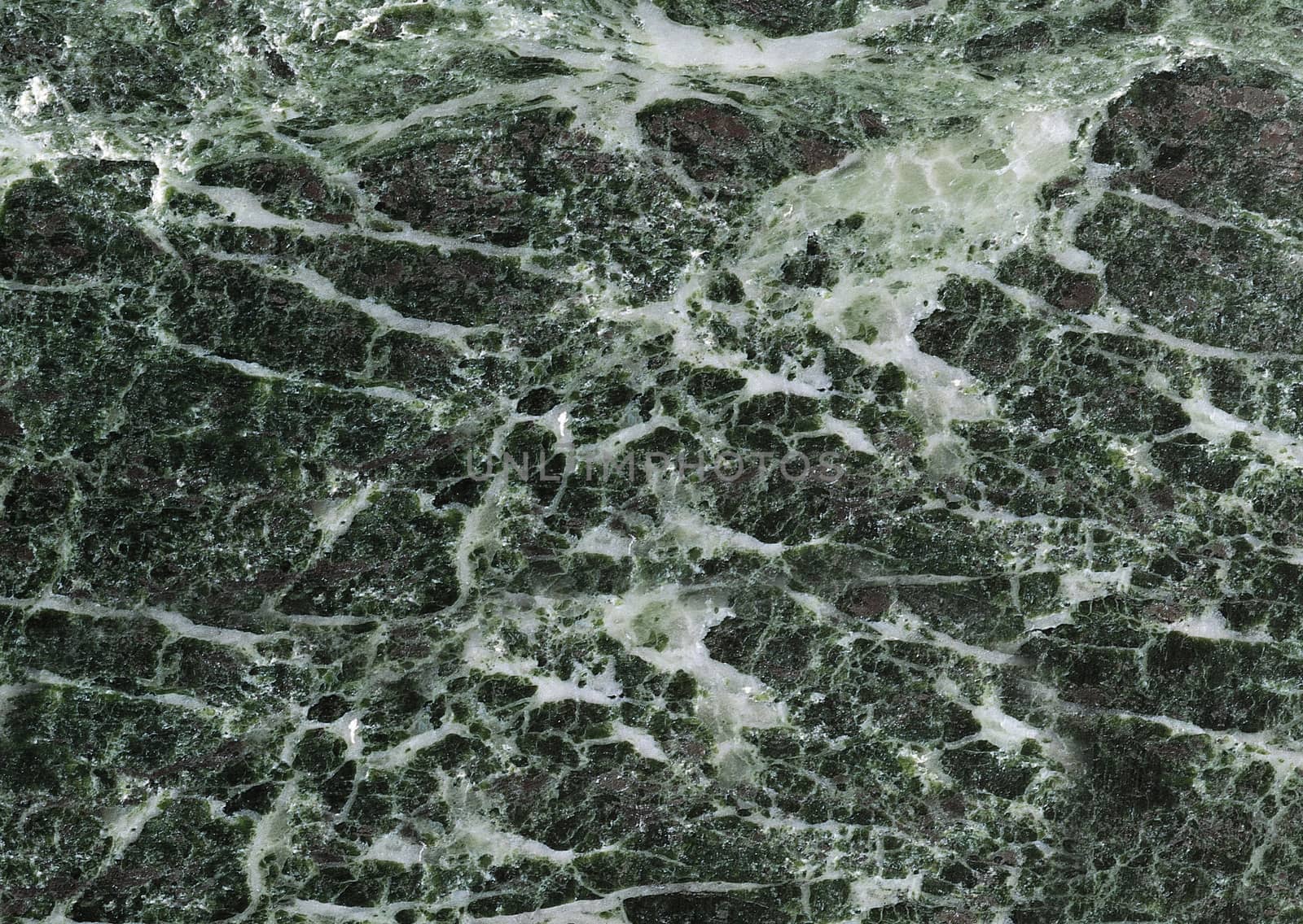 Textured smooth grey marble floor with white streaks