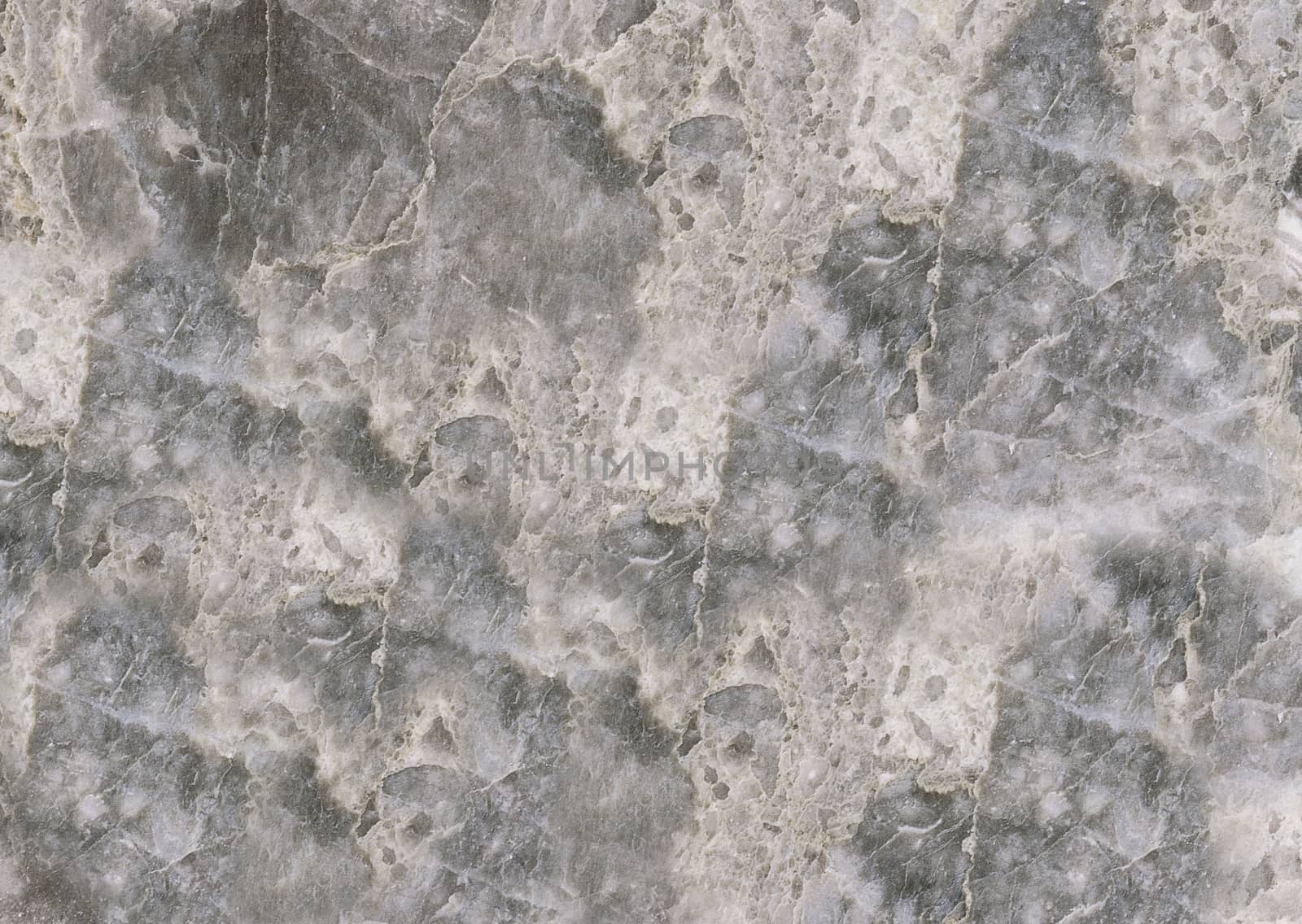 Textured grey marble stone with white streaks