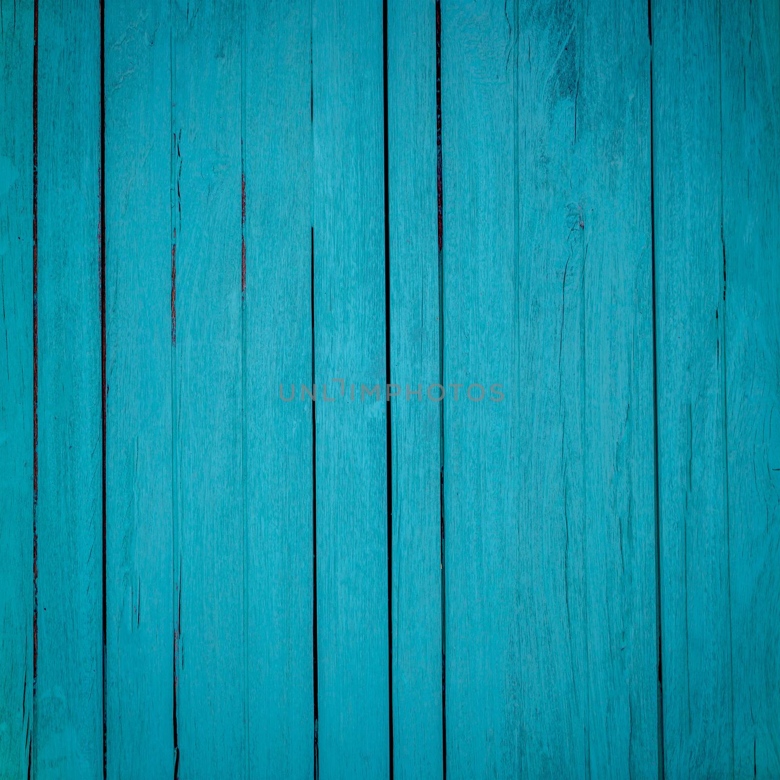 The fence of the Board is painted in turquoise background color or texture