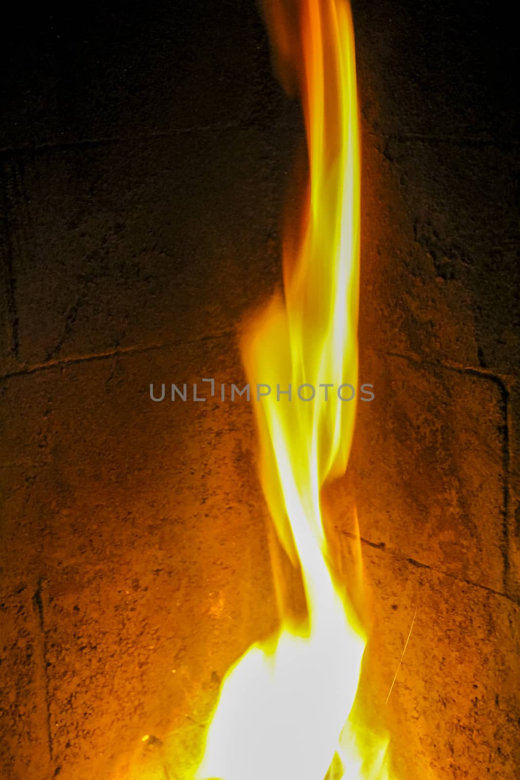 Romantic bright open fire on wood in a hut, Norway. by Arkadij