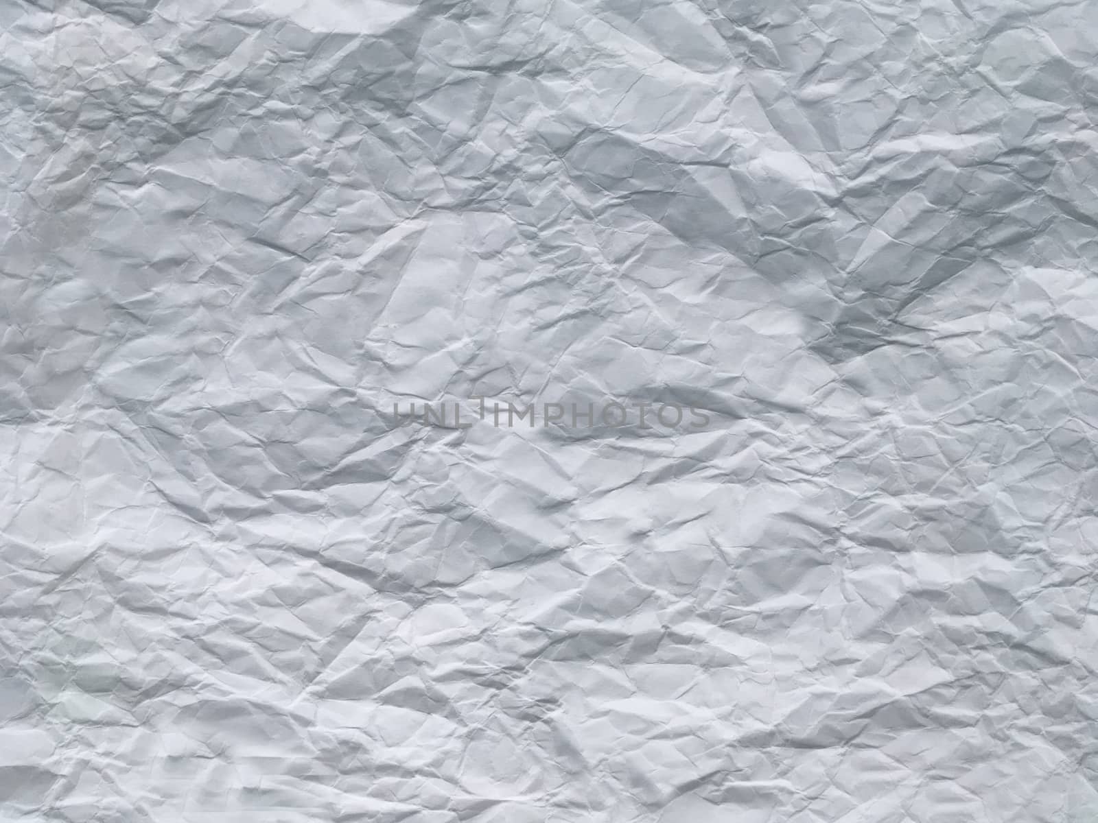 Crumpled sheet of white paper square shape.Texture or background