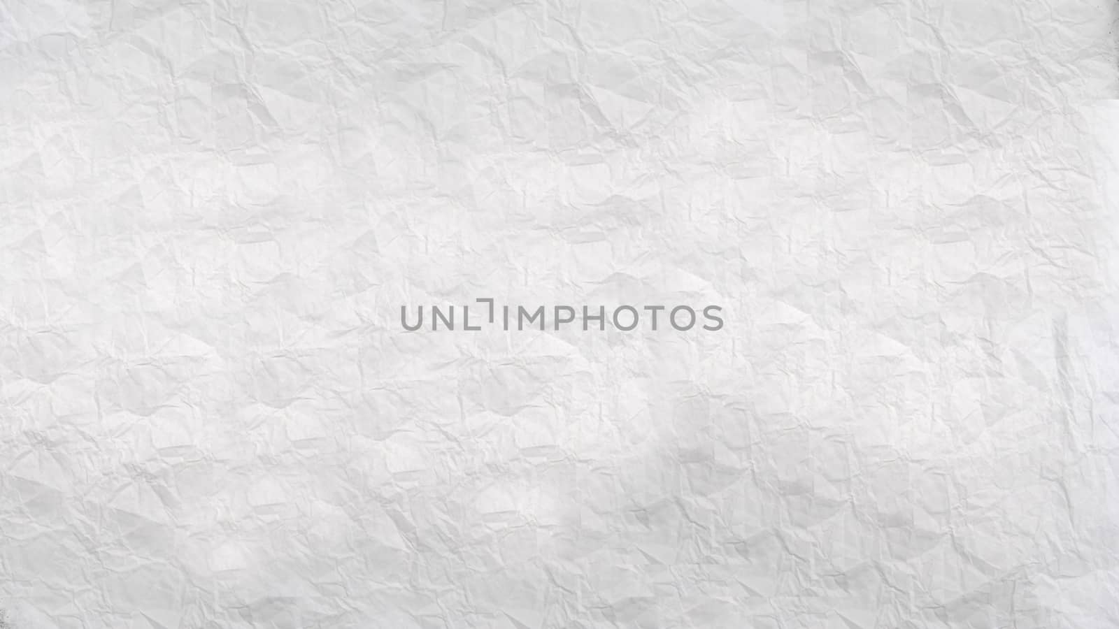 A crumpled sheet of white paper with a textured surface .Texture or background