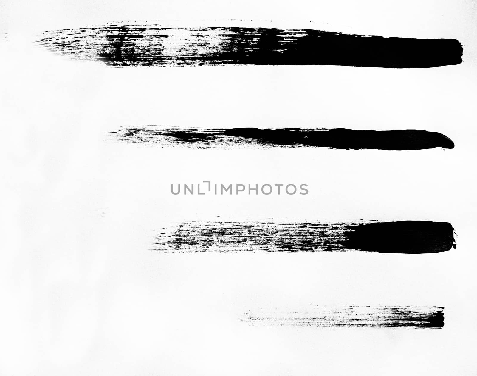 A set of black marker paint strokes isolated on a white background. Texture or background