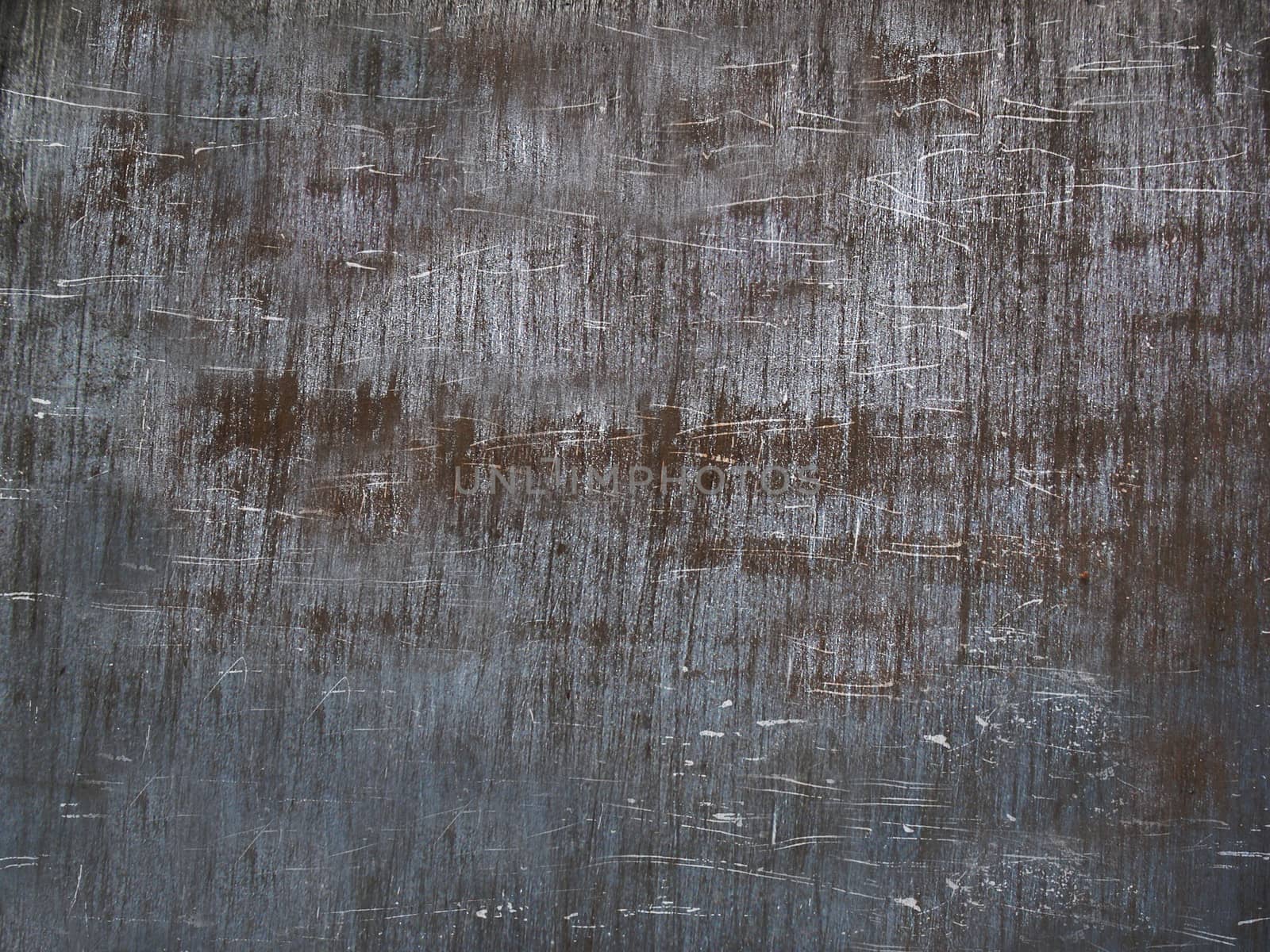 The scratched rusty metal surface is gray .Background or texture