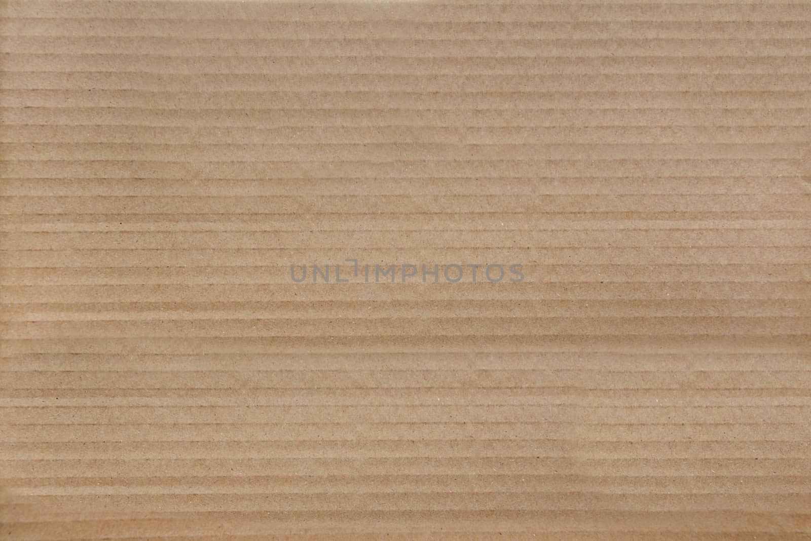 Textured brown cardboard as a background.Texture or background