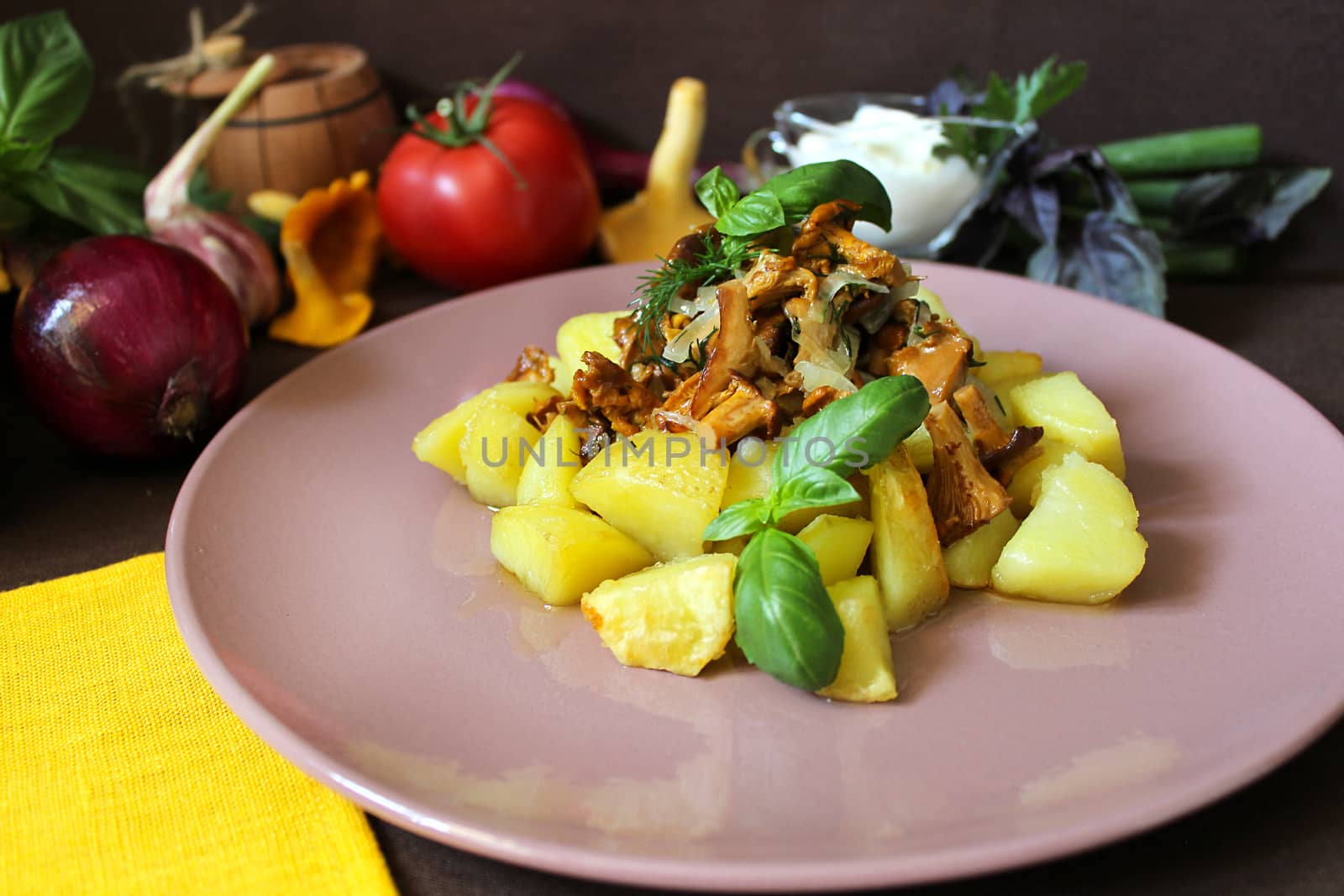Dish with fried mushrooms and potatoes seasoned with sauce