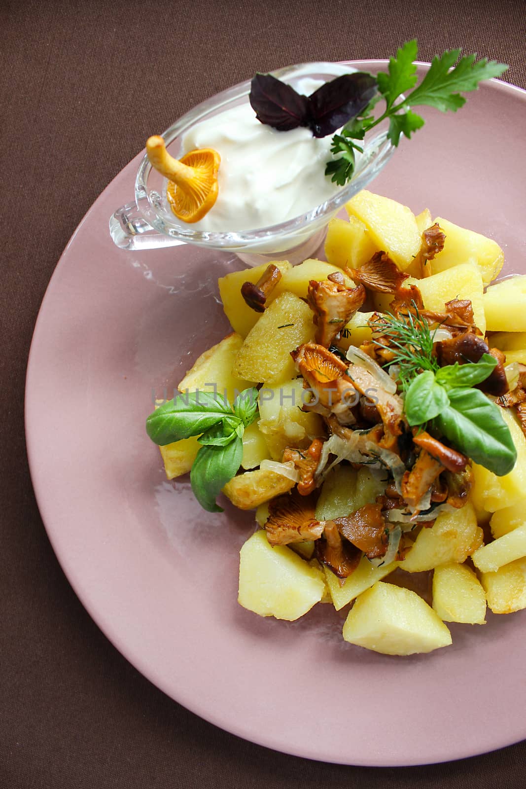 Homemade food country style potatoes with fried chanterelles.Texture or background