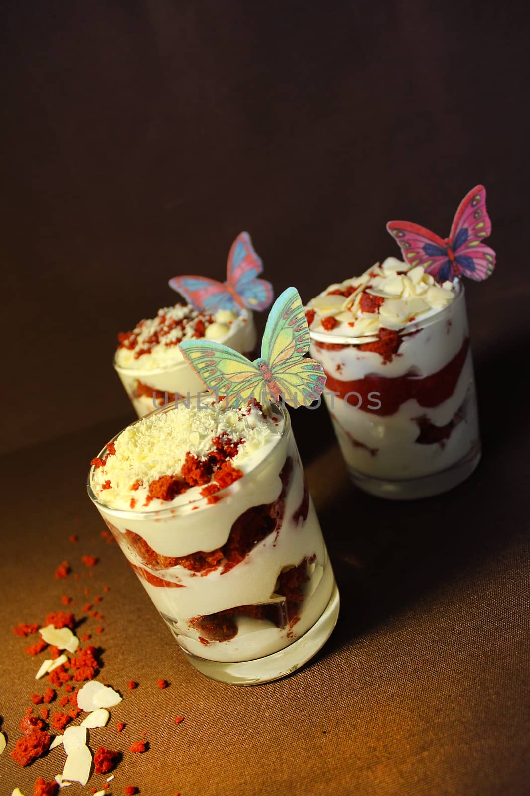 Strawberry flavored ice cream decorated with strawberry slices and white chocolate