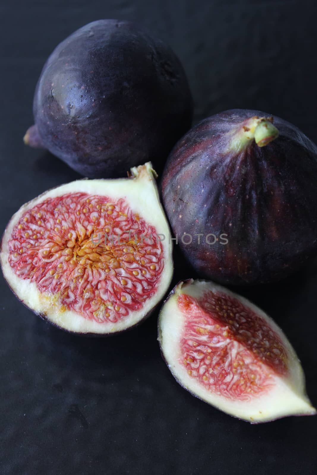 Slices of juicy figs close-up.Texture or background