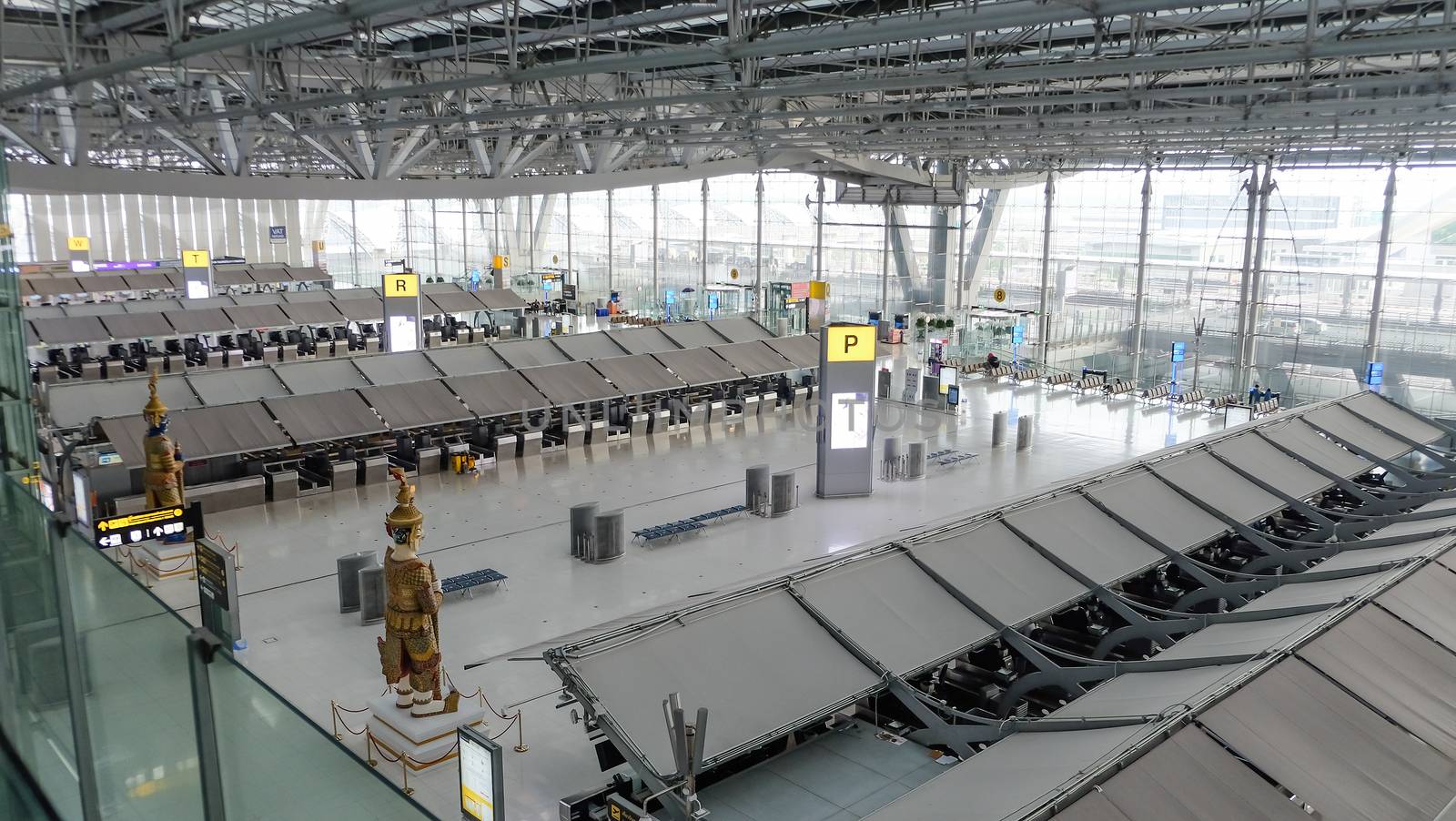 Bangkok, Thailand - August 14, 2020 : Atmosphere in the airport at Suvarnabhumi Airport during COVID-19 epidemic situation. No passengers because of Coronavirus pandemic and airport Lockdown
