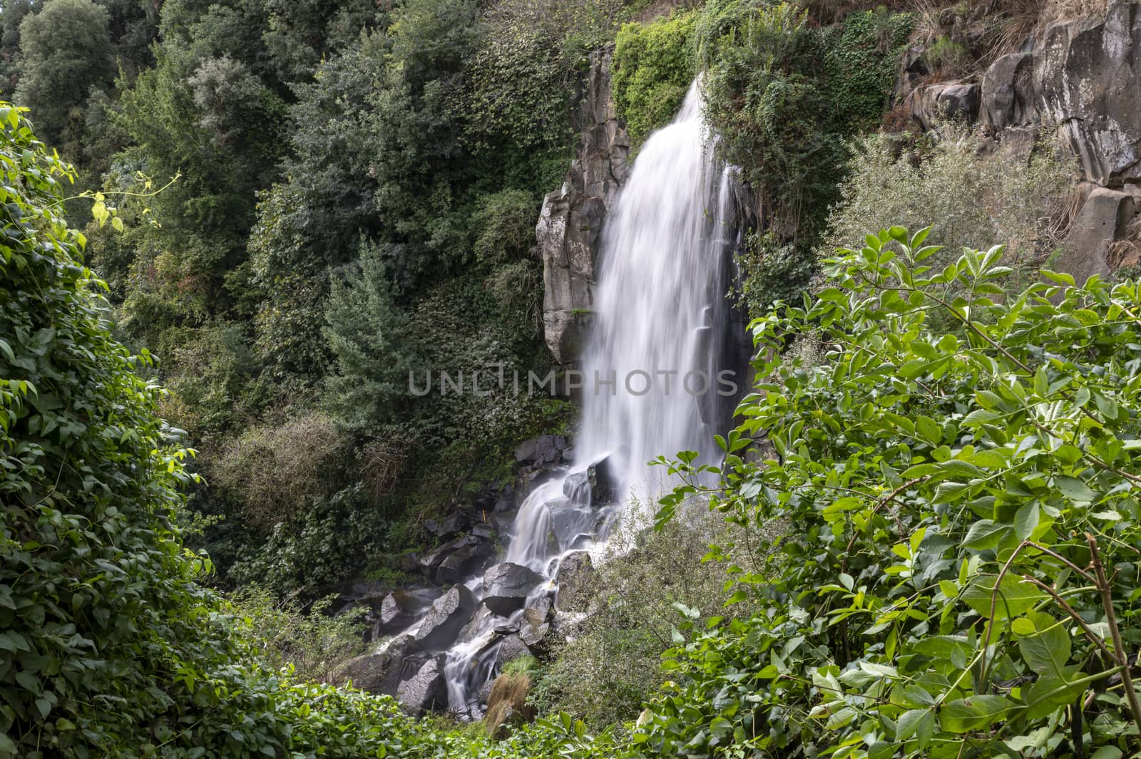 the waterfall of nepi surrounded by greenery in provoncia di rome