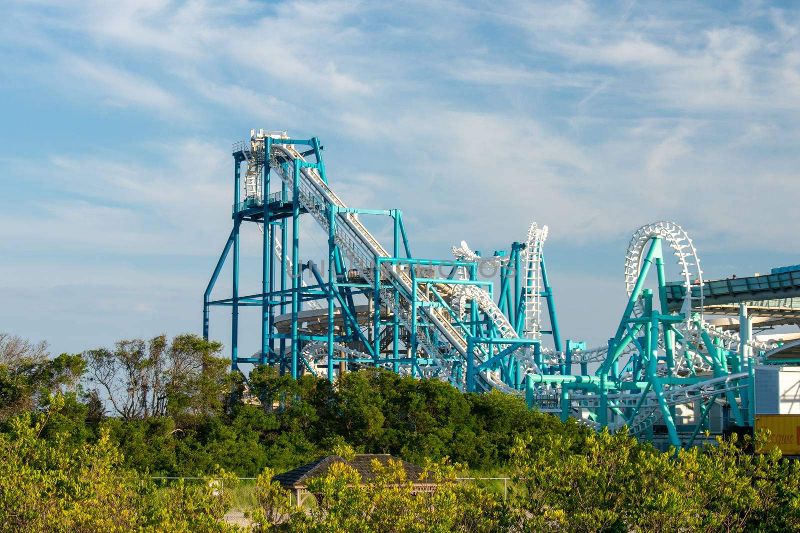 A Blue and White Metal Rollercoaster on the Wildwood Boardwalk i by bju12290