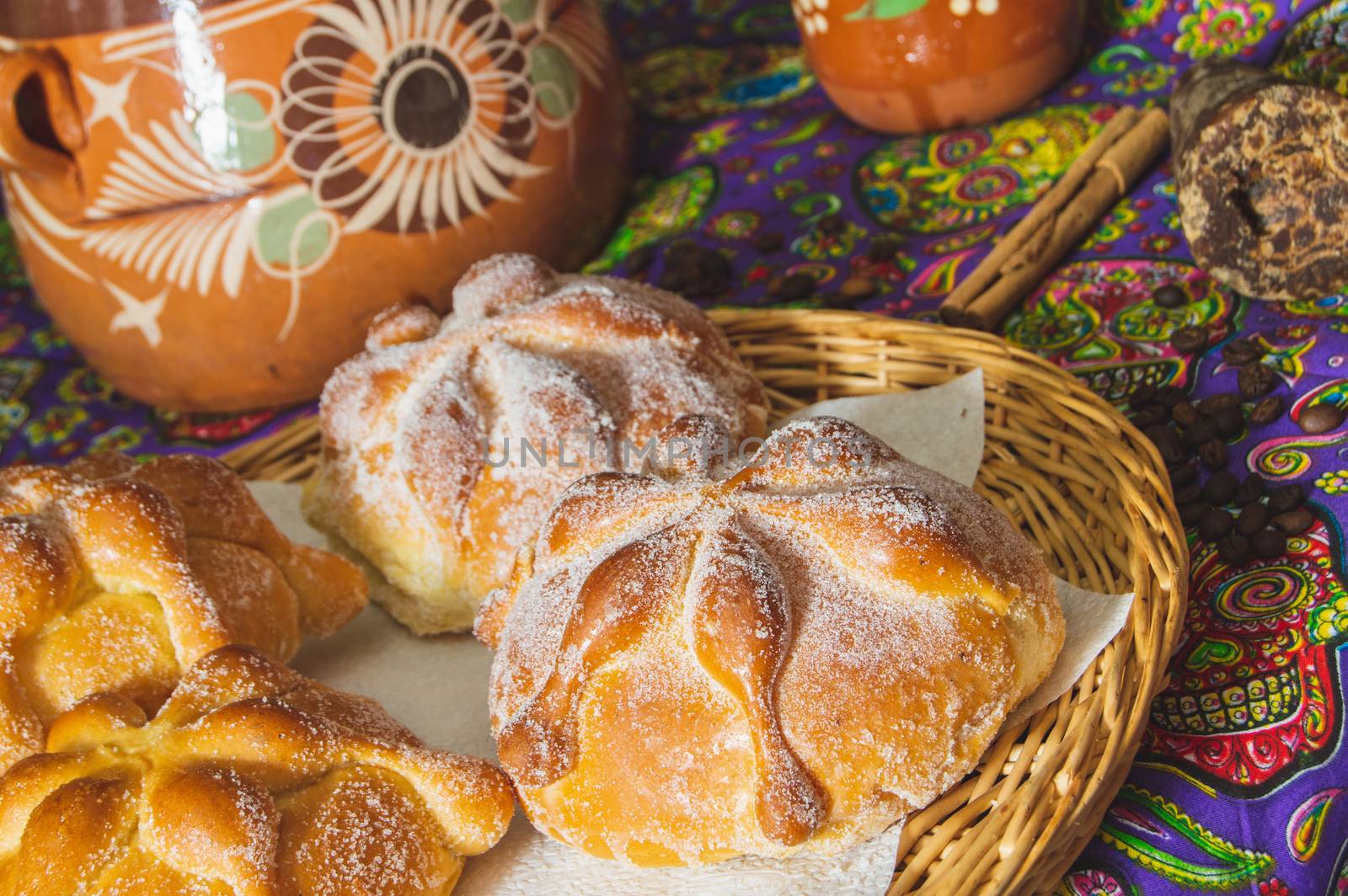 Traditional Mexican bread of the dead, pan de muerto, with coffee by RobertPB