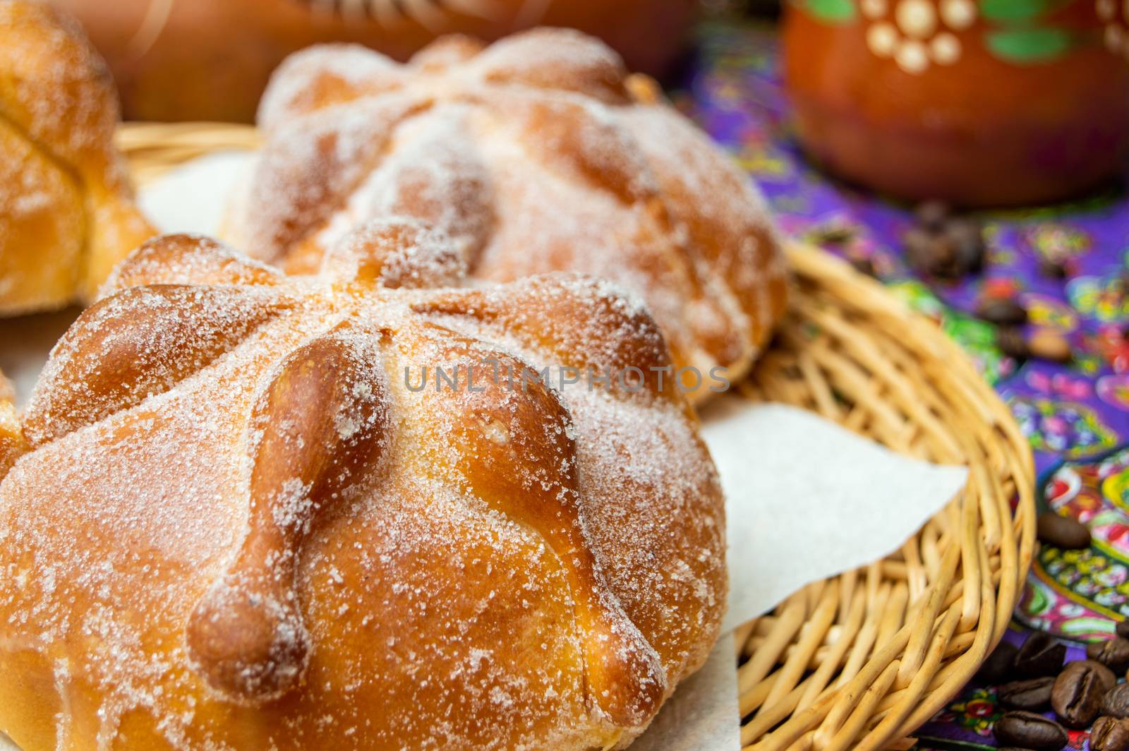 Traditional Mexican bread of the dead, pan de muerto, with coffee by RobertPB
