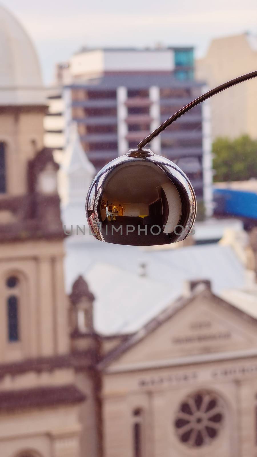 Lamp In Front Of A Window by 	JacksonStock