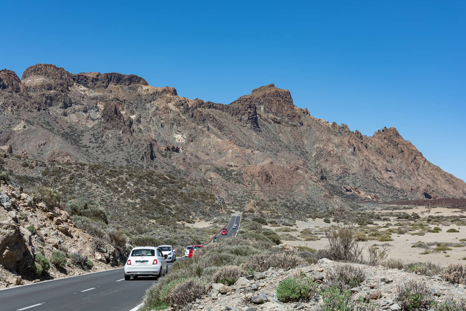 Tenerife island, Spain - 05/10/2018: a String of cars rides on a mountain road
