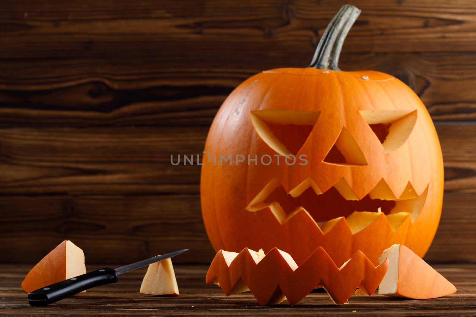 Carving Halloween pumpkin by Yellowj