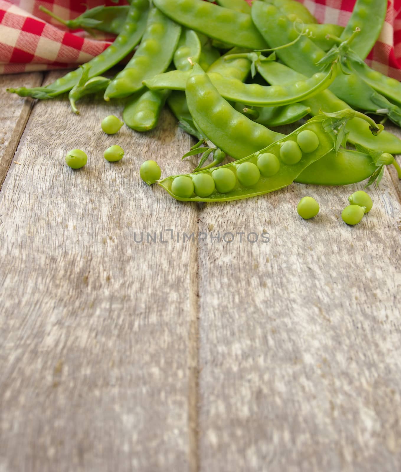 peas on wooden background