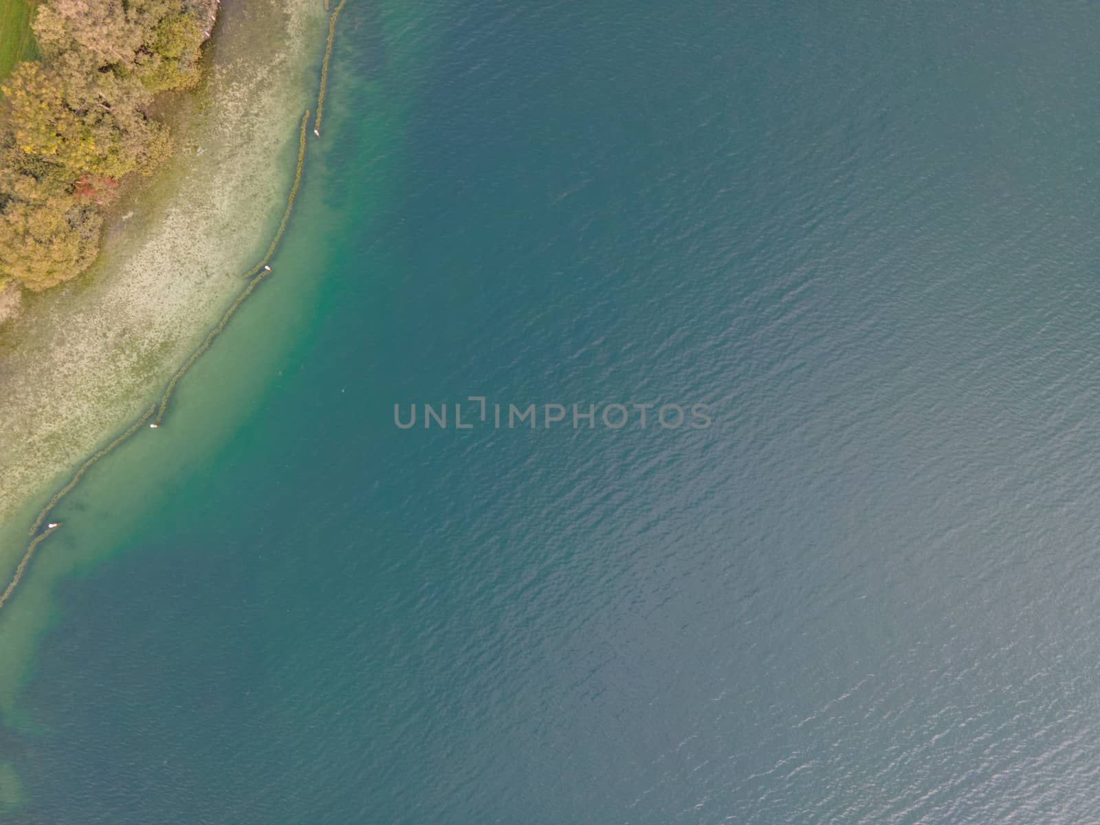 Drone shot over water. Background of lake. Birds view