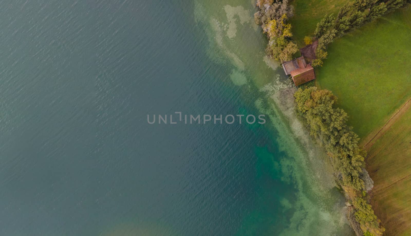 Drone shot over water. Background of lake. Birds view