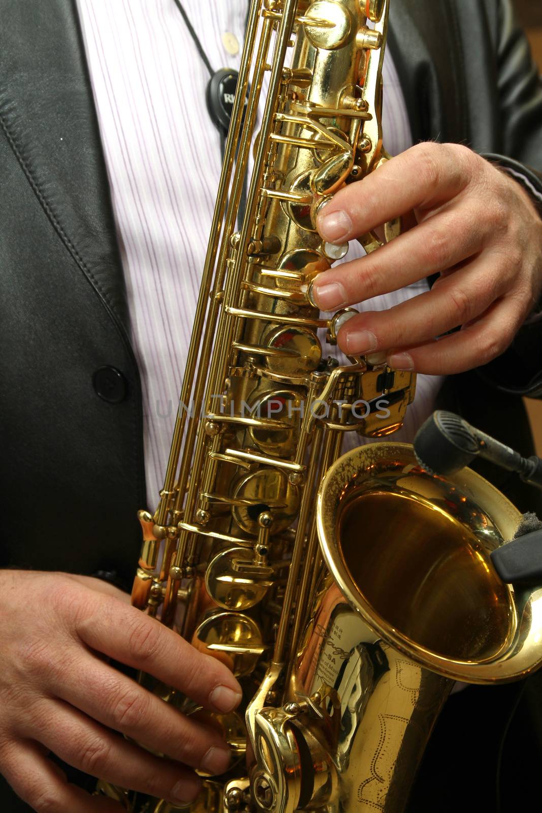Saxophone player Saxophonist playing jazz music instrument