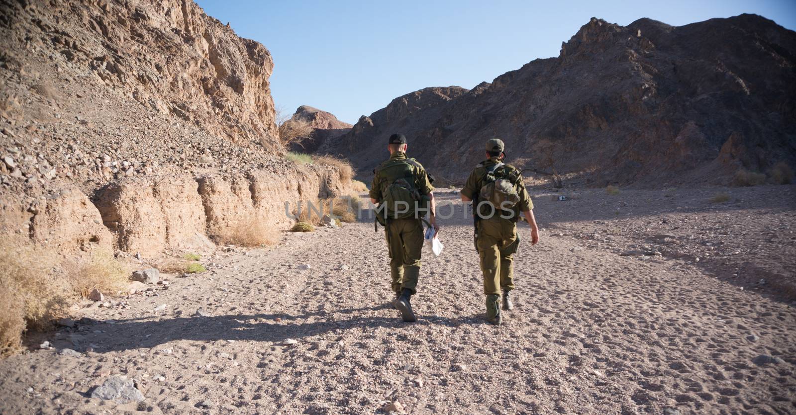 Soldiers patrol in desert by javax