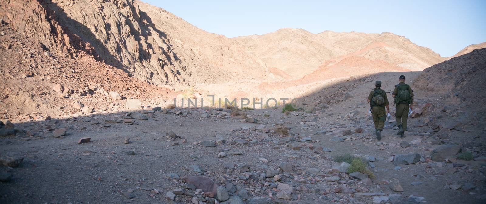 Soldiers patrol in desert by javax