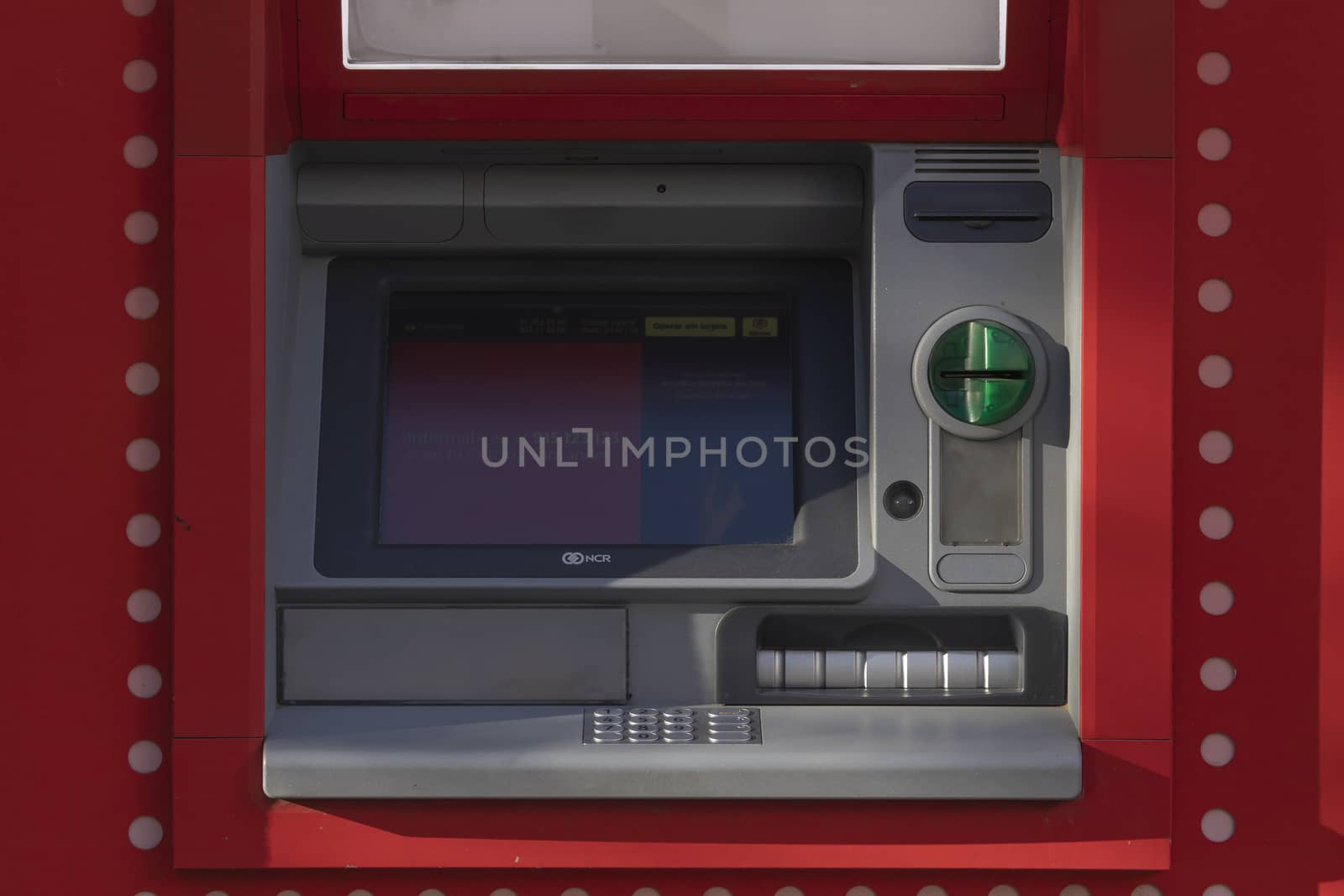 An outdoor Santander bank ATM machine, Madrid by alvarobueno