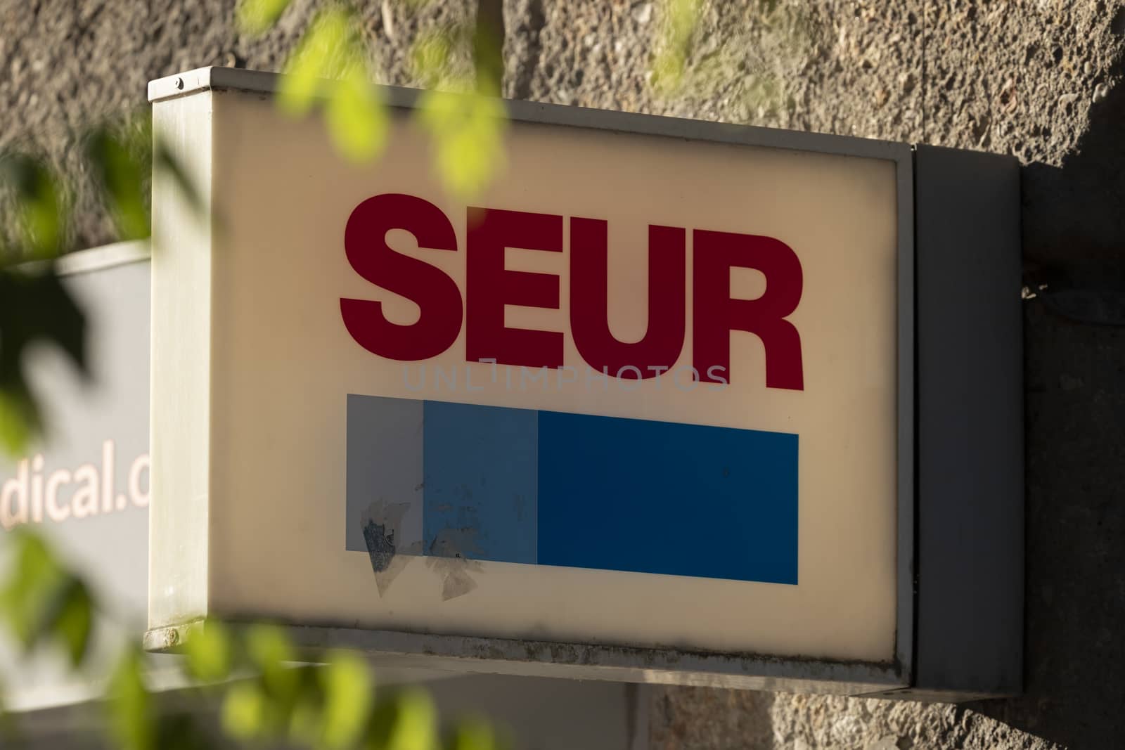 Madrid, Spain - May 18, 2020: Main access area to the SEUR transport and parcel services office, in the Retiro district.