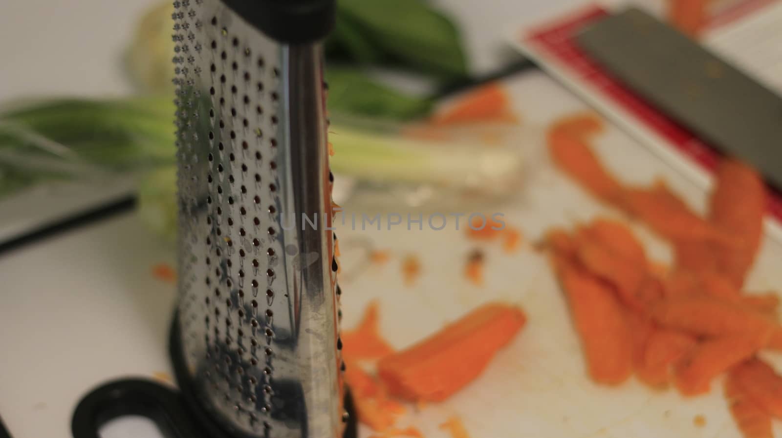 peeling and shredding carrots. High quality photo