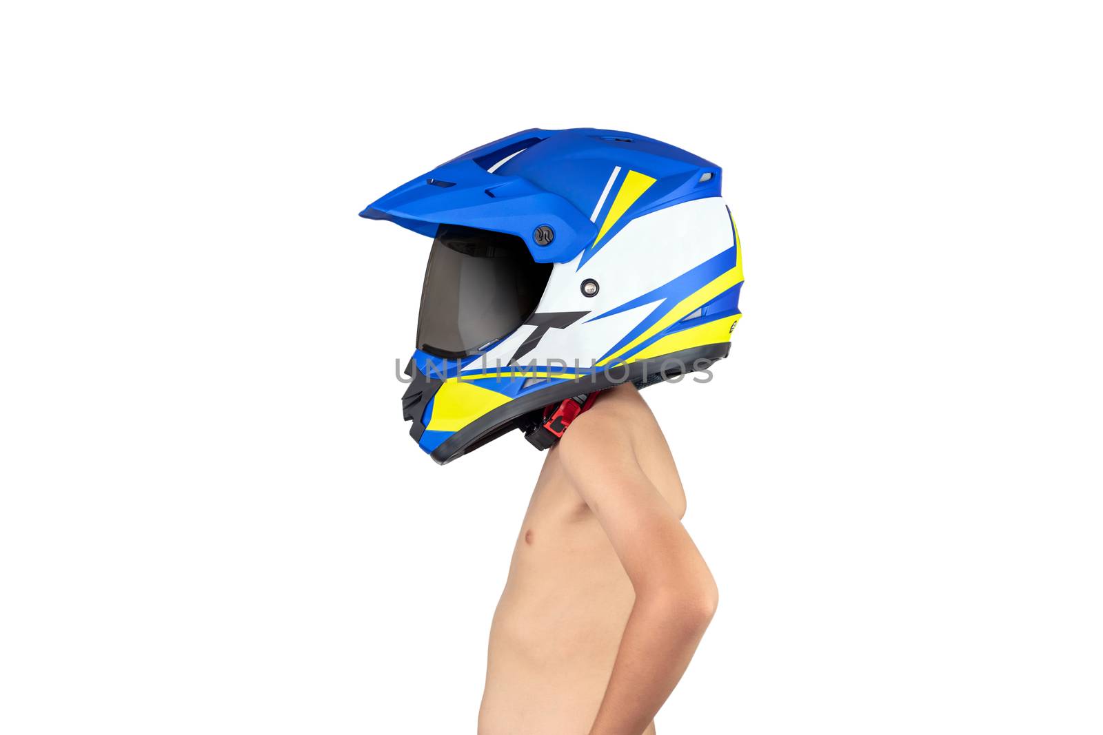 A boy wearing a motocross helmet. by wattanaphob