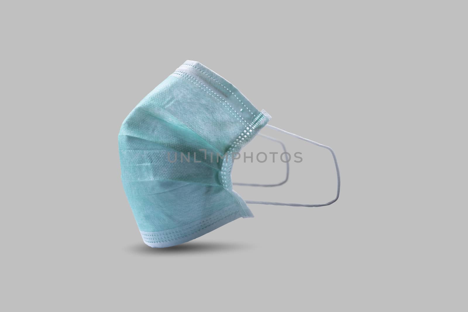 Sanitary napkin mask for preventing spreading and respiratory infections isolated on gray background, Stop Coronavirus Covid-19 concept.