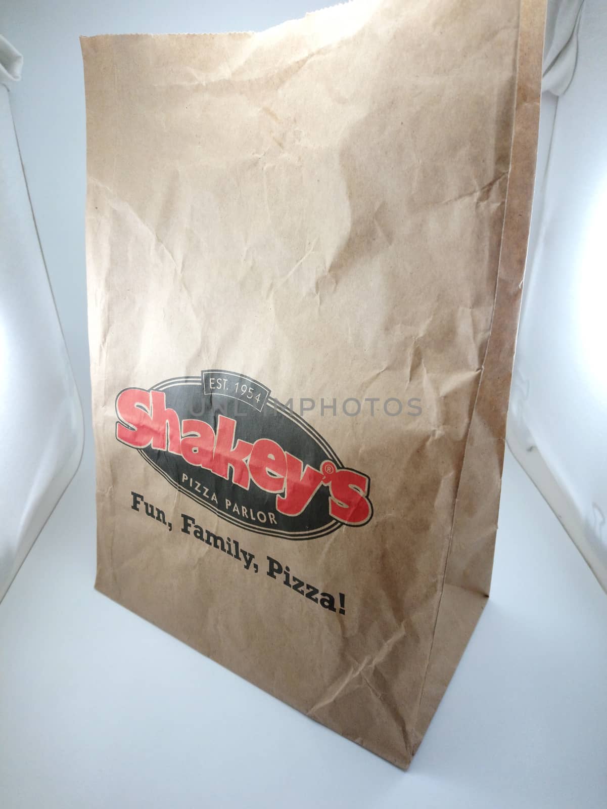 Shakeys brown paper bag in Manila, Philippines by imwaltersy