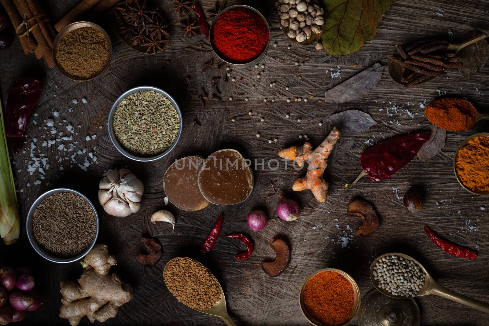 Condiment of indian food Spice garnish background on wood table  by golfmhee