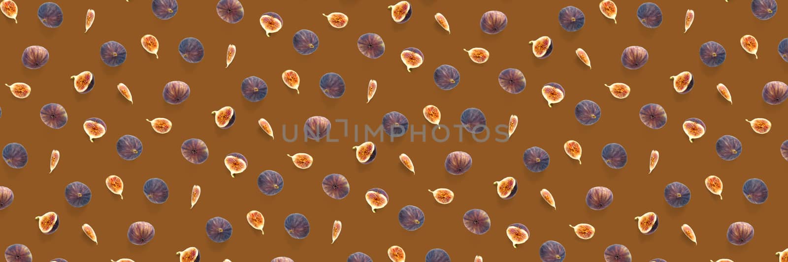 Background from Fresh figs. Food Photo. Modern fig fruits background. Creative set of the whole and sliced figs on a orange background, not pattern
