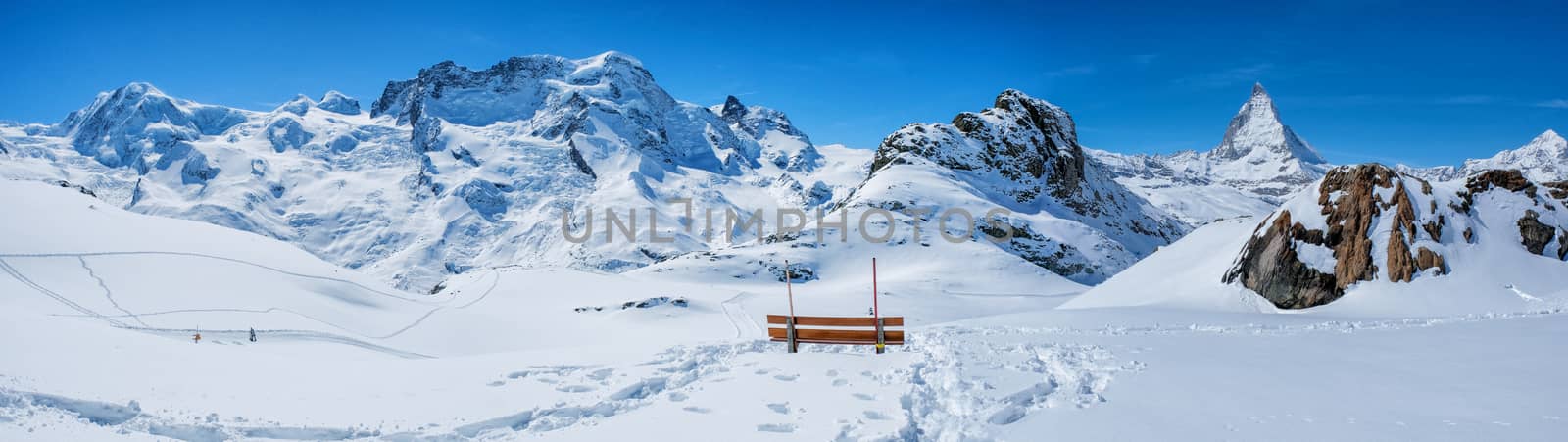 Panoramic beautiful view bench in snow mountain Matterhorn peak, Zermatt, Switzerland.