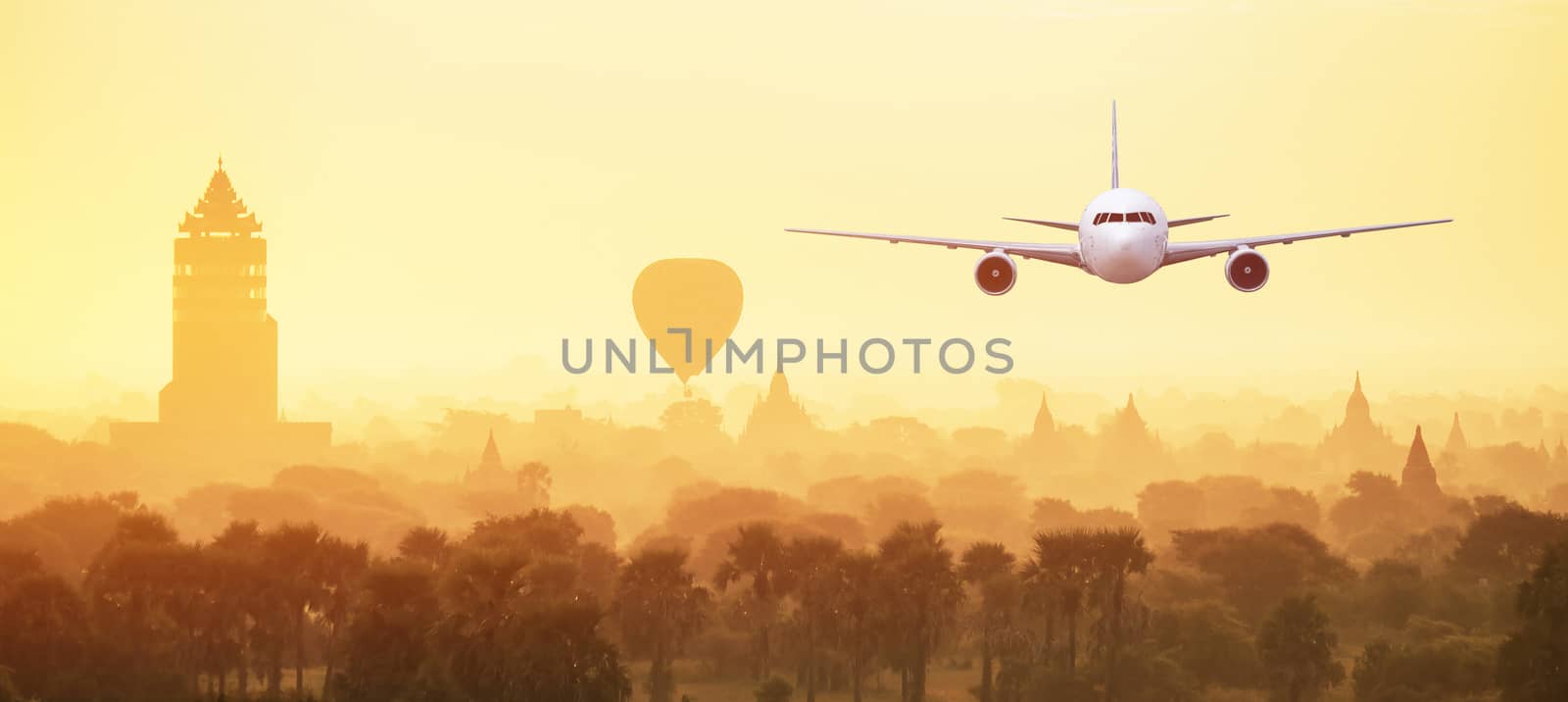 Front of real plane aircraft, on Pagoda Sunset in Bagan,Myanmar  by Surasak