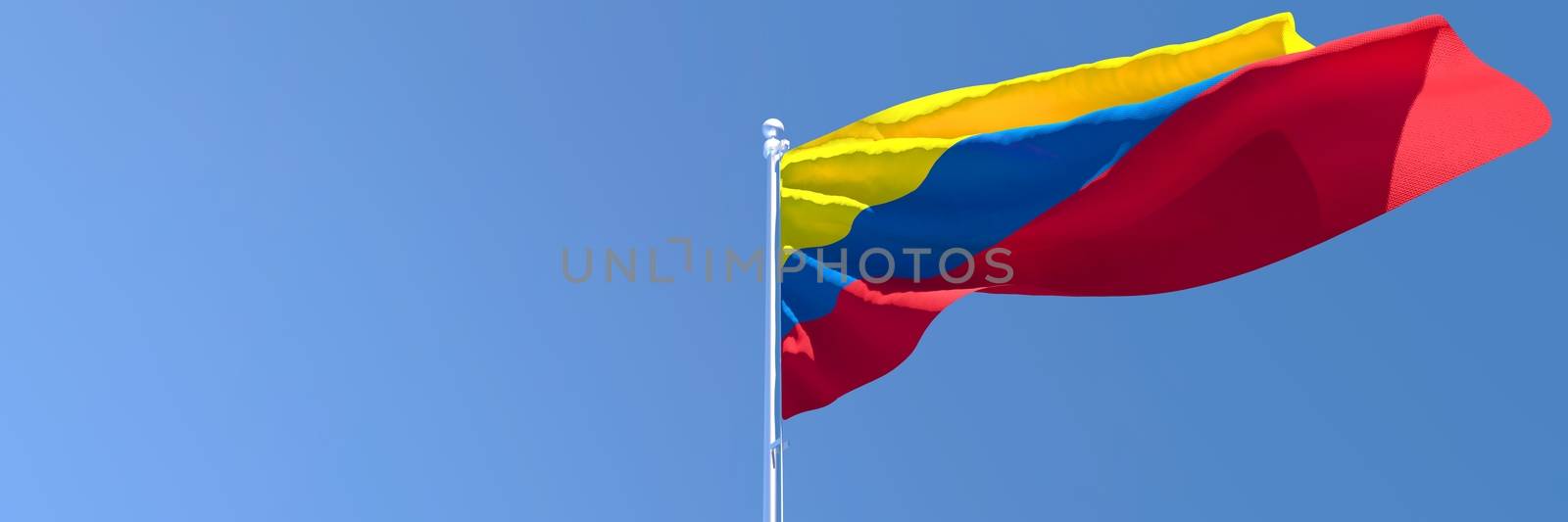 3D rendering of the national flag of Colombia waving in the wind against a blue sky