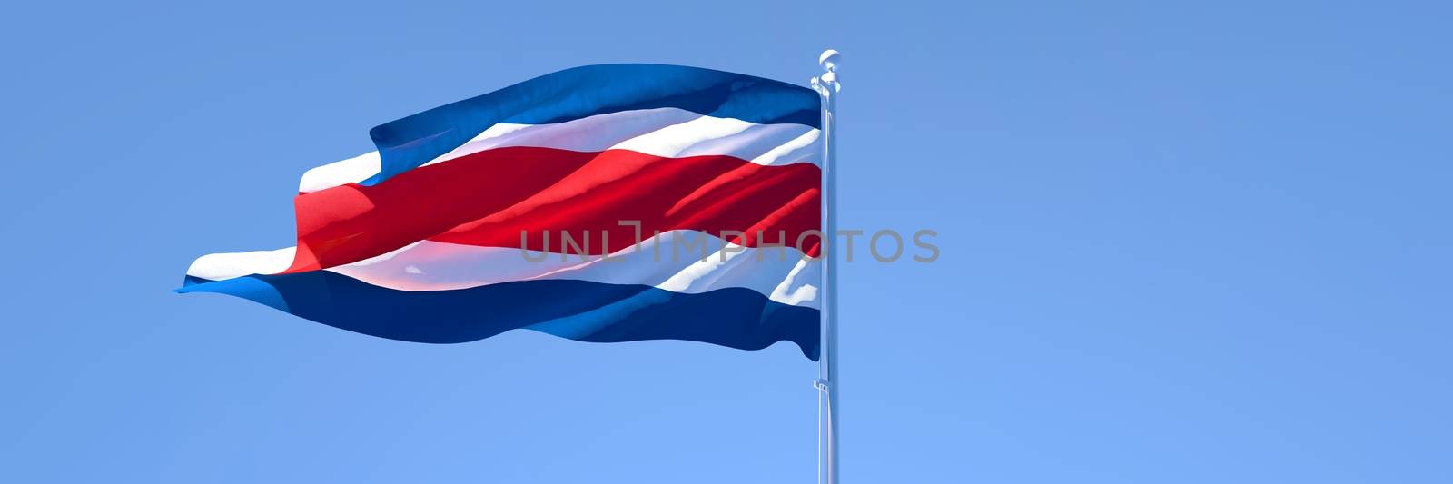 3D rendering of the national flag of Costa Rica waving in the wind against a blue sky