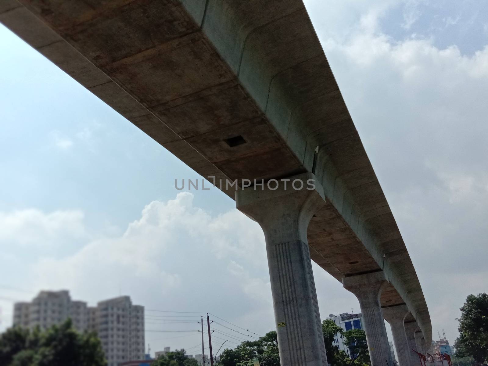 stylish concrete flyover bridge on city with sky