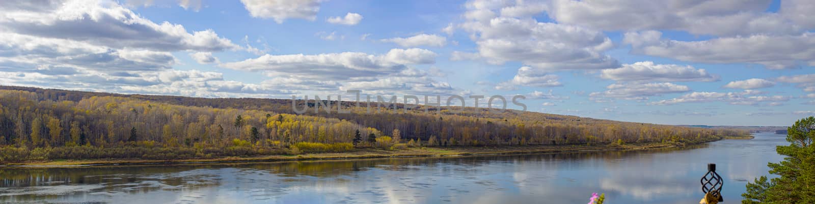 Beautiful, wide river autumn among the woods. Panorama  by AnatoliiFoto
