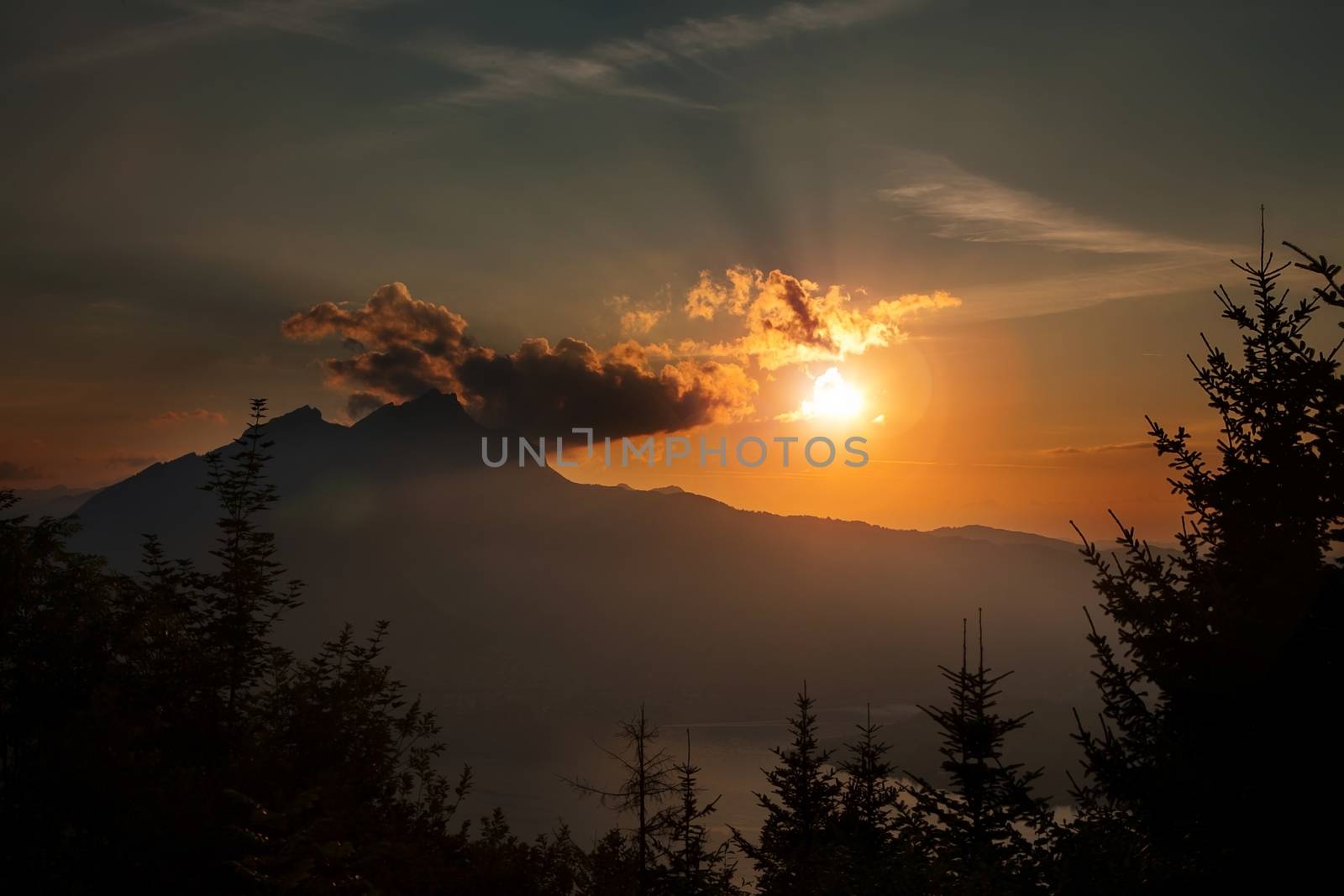 Sunaet with clouds with mount Pilatus. Copy space by PeterHofstetter