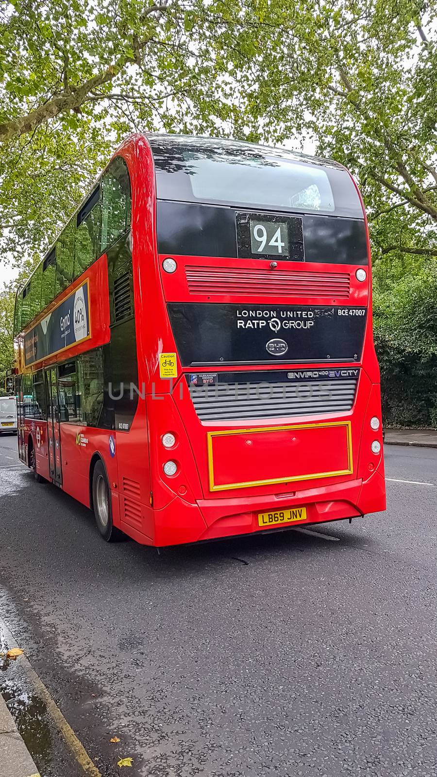 London, UK - July 8, 2020: Modern red double-decker bus is waiting for people in central London. Bus 94.