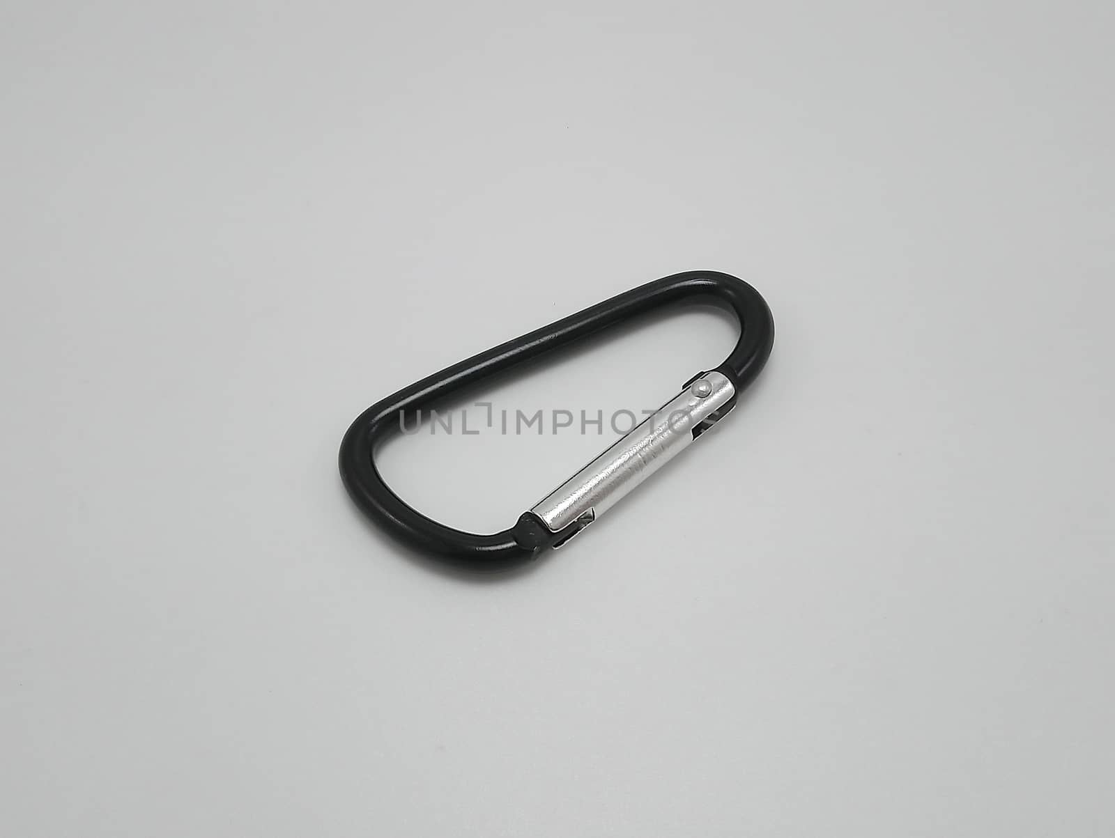 Black clip put on pants waist accessory use to hold multiple keys