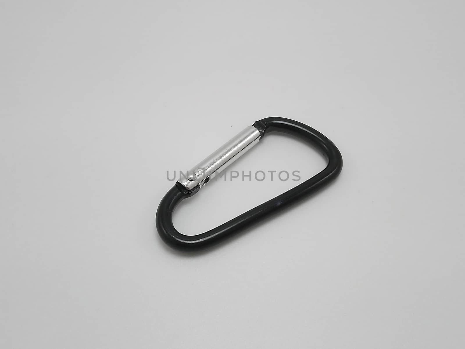 Black clip put on pants waist accessory use to hold multiple keys