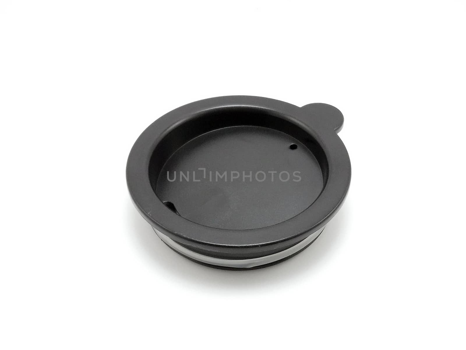 Self stirring mug black lid use to cover the top of mug while not in use