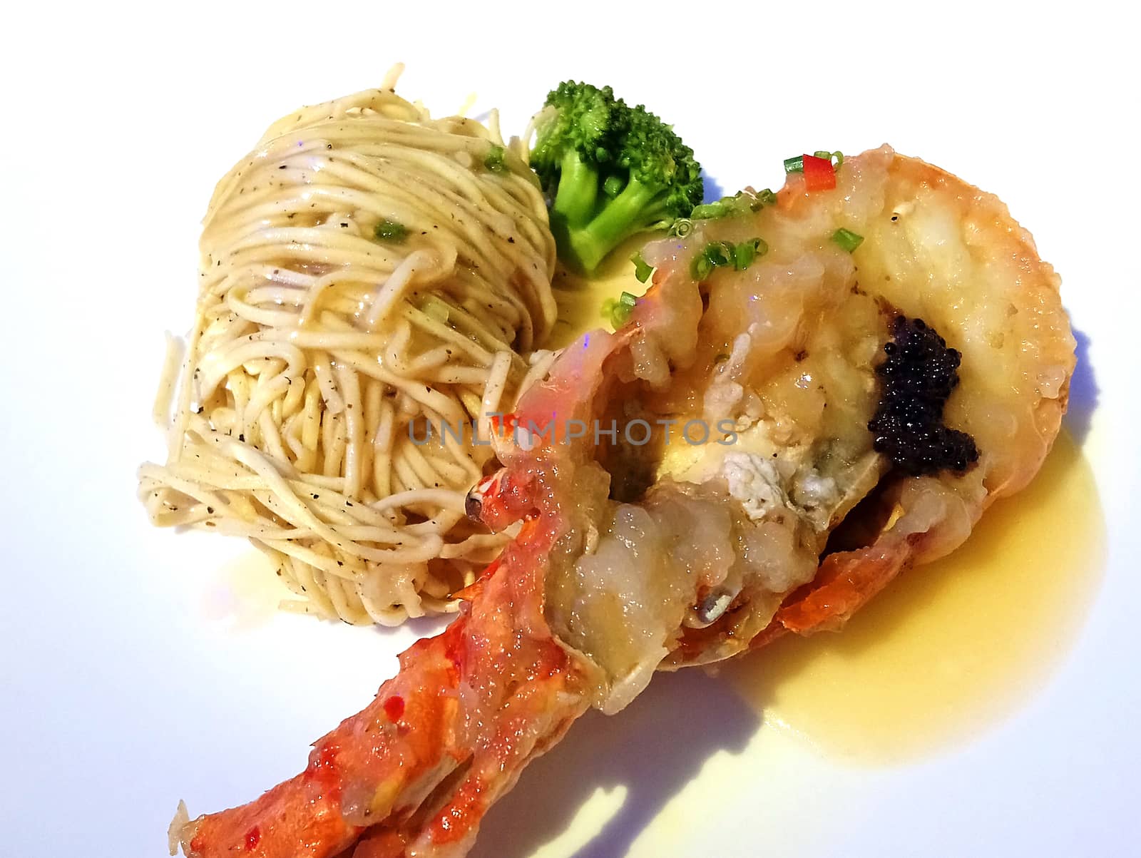 Lobster slice with noodles on white plate  by imwaltersy