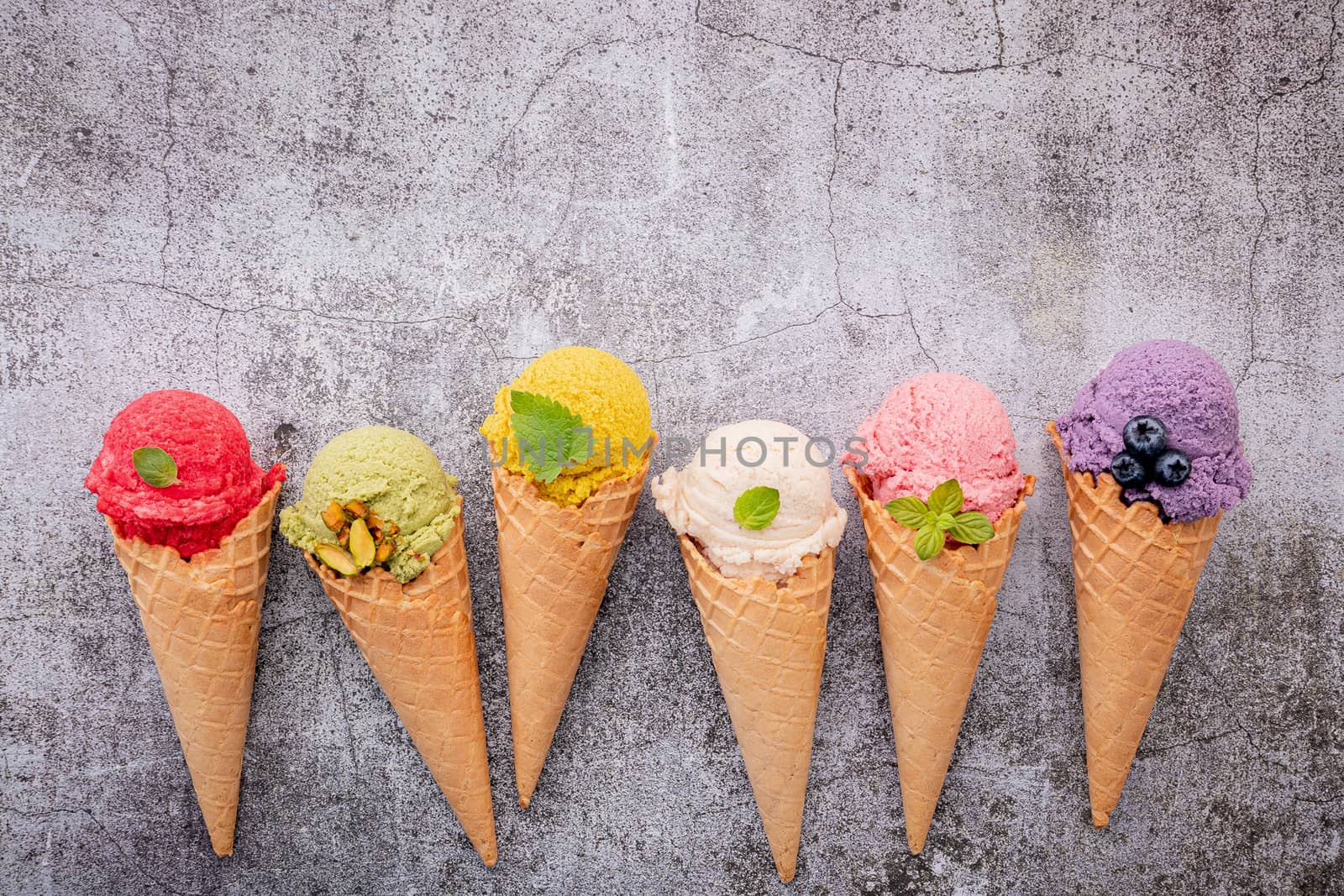 Various of ice cream flavor in cones blueberry ,green tea ,pista by kerdkanno